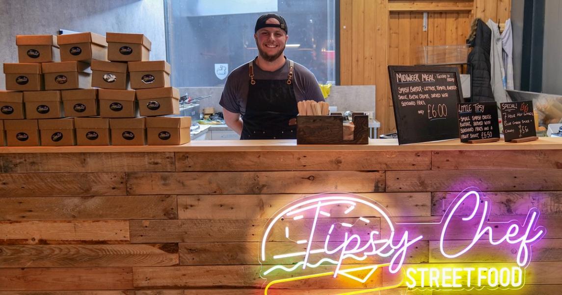 Tipsy Chef trader behind stall Tipsy Chef trader behind stall
