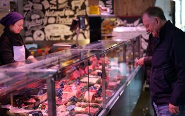 Customer browsing meat selection