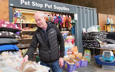 Trader stood outside stall