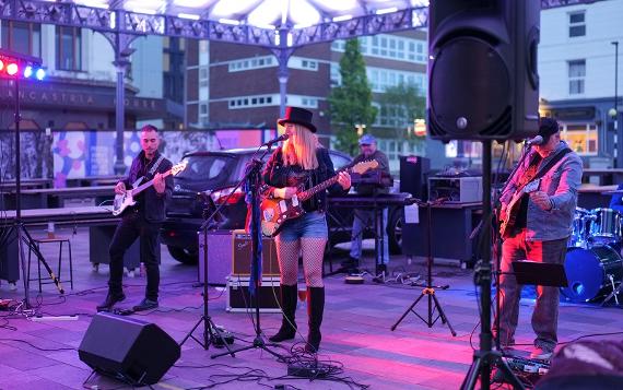 Band playing outside The Orchard Bar