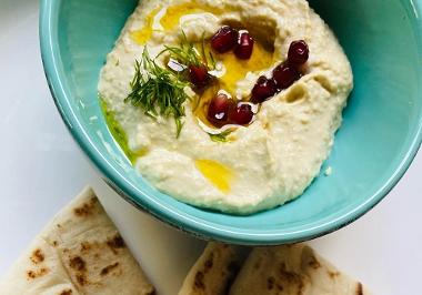 Close up of hummus and bread