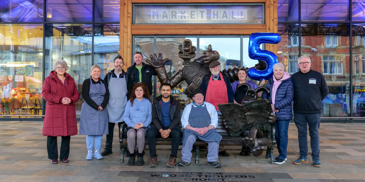 Traders outside Market Hall with balloon Traders outside Market Hall with balloon