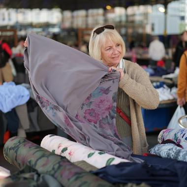 Trader holding fabric