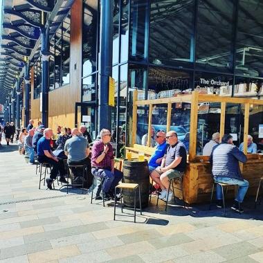 People enjoying drinks outside 