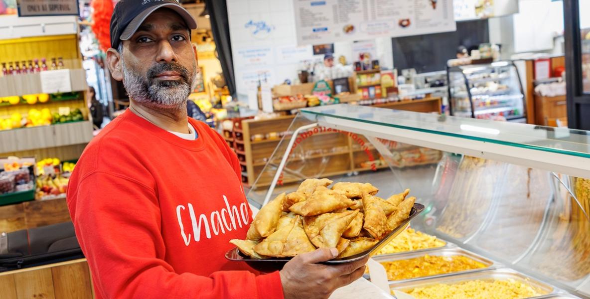 Chacha's trader carrying samosas