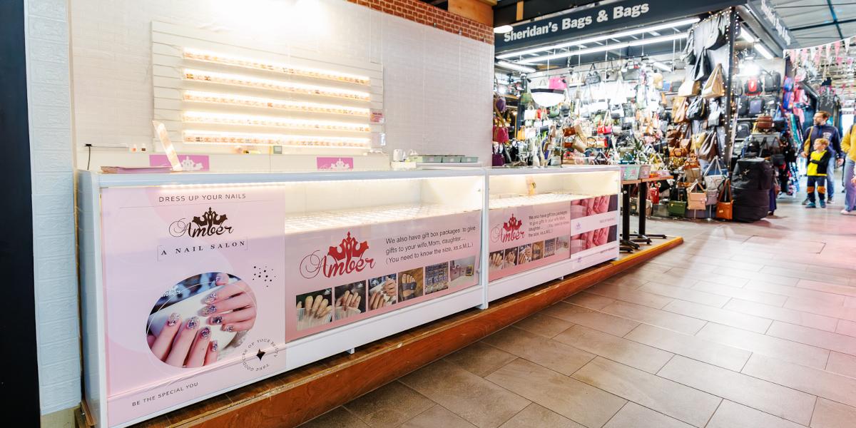 The front counter for Amber Nails inside Preston Markets Hall