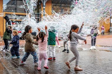 Children playing with bubbles