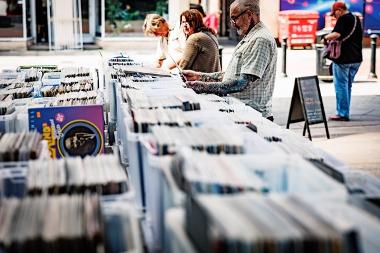 People browsing through records